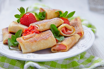 Fresh Strawberry French Crepes with Mint for Breakfast