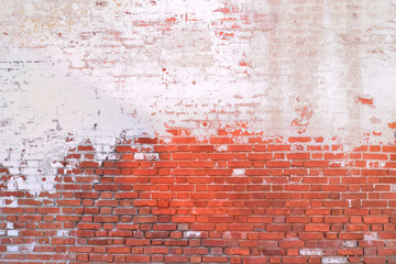 old brick wall painted half background
