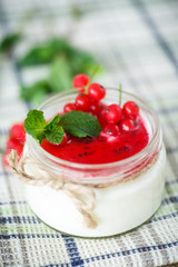 sweet  yogurt with jam and red currant