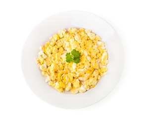 plate of scrambled eggs with parsley
