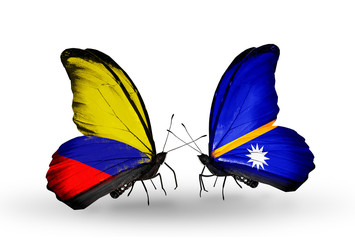 Two butterflies with flags Columbia and Nauru