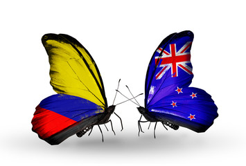 Two butterflies with flags Columbia and New Zealand
