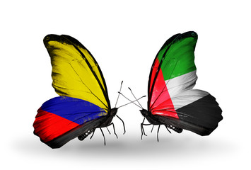 Two butterflies with flags Columbia and UAE