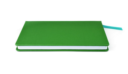 Green notebook isolated on white background.