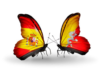 Two butterflies with flags Spain and Bhutan