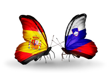 Two butterflies with flags Spain and Slovenia