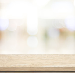Empty table and blurred store bokeh background, product display