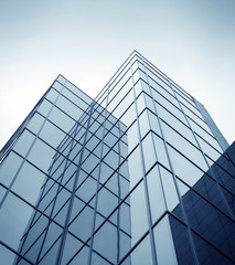 Fototapeta na wymiar blue texture of glass building