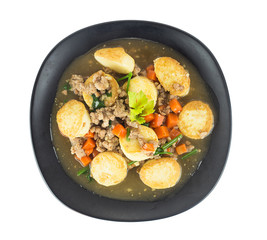 Stir fried tofu with pork and carrot on white