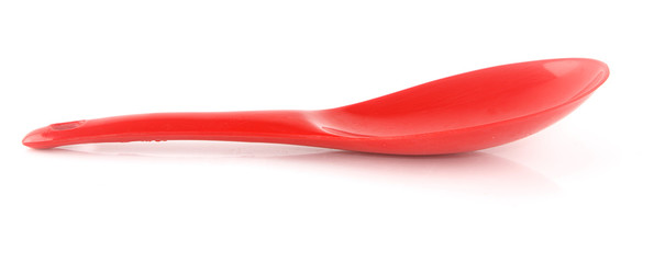 Plastic ladle on white background