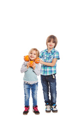 Oranges in hands of children