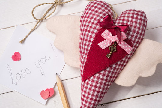 Declaration of love on Valentine's Day. Textile toy made by hand