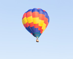 Hot air balloon on blue sky background
