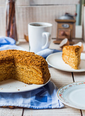 a piece of honey cake with sour cream and nuts