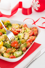 fresh salad with vegetables in white bowl