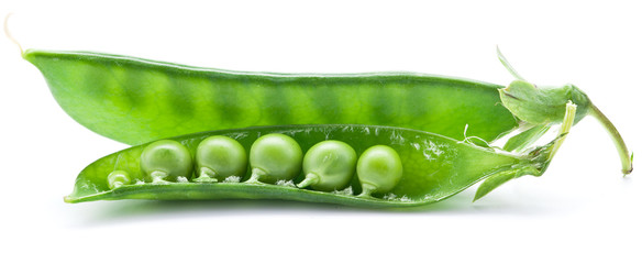 Fresh peas are contained within a pod.
