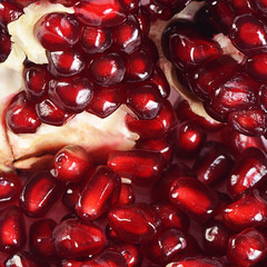 The fresh pomegranate as a background