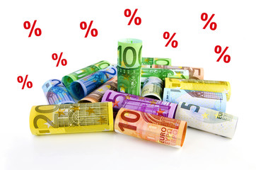 Euro-Geldrollen und Prozentzeichen