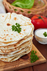 Flour tortillas on a cutting board