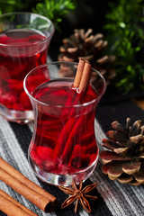 Glass of mulled wine and spices