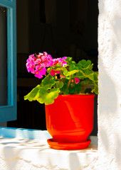 red window in Chora the capital of Amorgos island in Greece