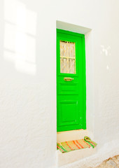 green door in Chora the capital of Amorgos island in Greece