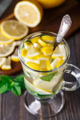 Glass with mint and lemon tea