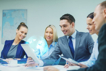 business team with tablet pc having discussion