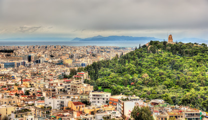 Fototapeta na wymiar View of Philopappos Monument on Mouseion Hill in Athens, Greece