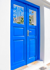 Obraz na płótnie Canvas blue door in Langada village in Amorgos island in Greece