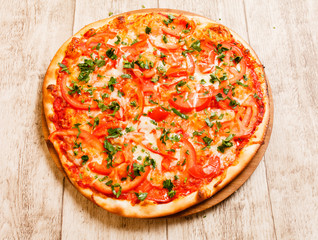 pizza on the wood background