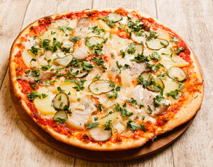 pizza on the wood background