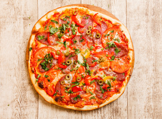pizza on the wood background