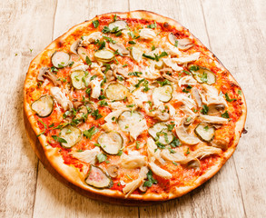 pizza on the wood background