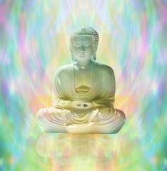 Buddha in peaceful meditation on rainbow colored energy formation background