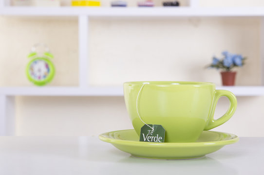 Splash of Green tea on a cup