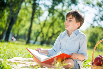 Boy in summer park