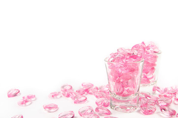 pink hearts glass  on white background