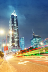 the light trails on the modern building background in shanghai 