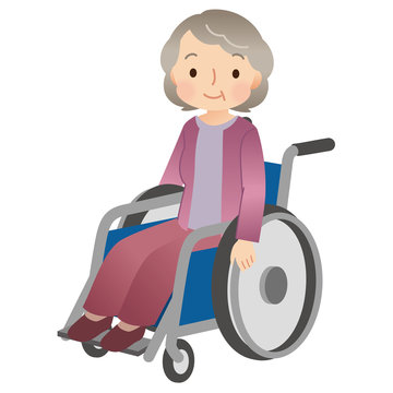 車椅子に乗る高齢者　女性