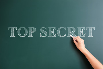 top secret written on blackboard