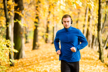 Man jogging and listening music