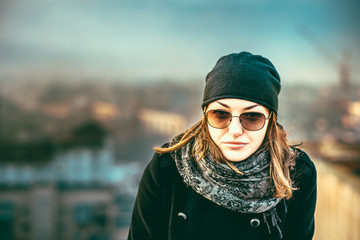 Girl on the top of high building