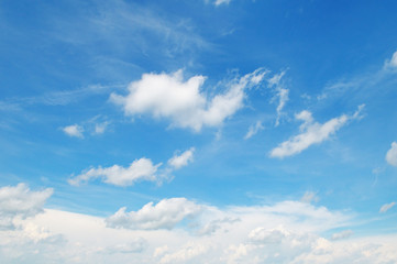 white clouds on a blue sky background
