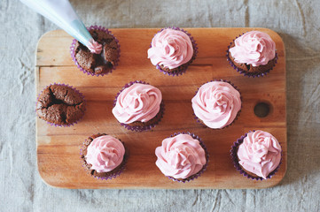 wooden panel with cupcakes