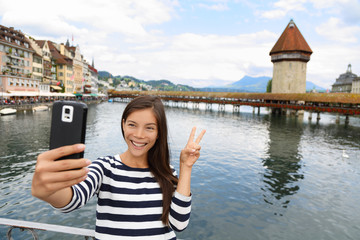 Tourist selfie woman in Lucerne Switzerland