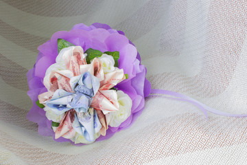 Bouquet of flowers made from currency baht