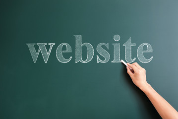 website written on blackboard