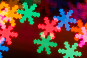 Blurred bokeh snowflakes background