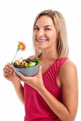 women eating salad